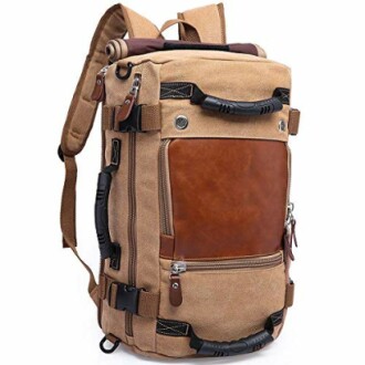 Canvas and leather backpack with multiple handles and pockets.