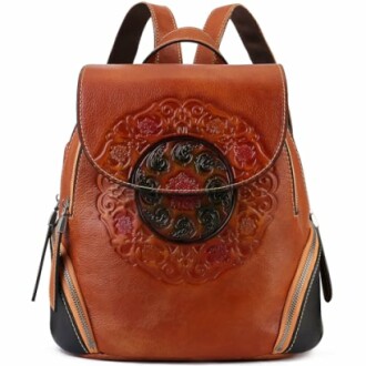 Brown leather backpack with embossed circular design.