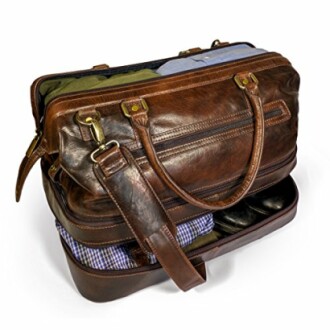 Brown leather duffel bag with clothes and shoes